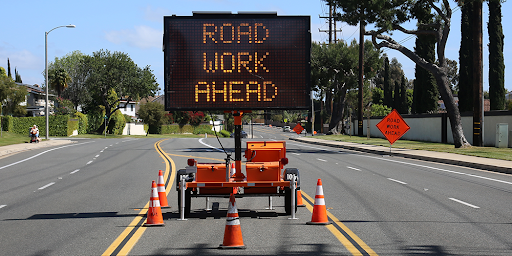 Sign stating Road Work Ahead