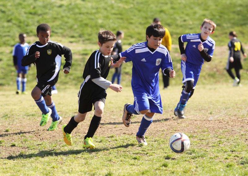 boys playing soccer