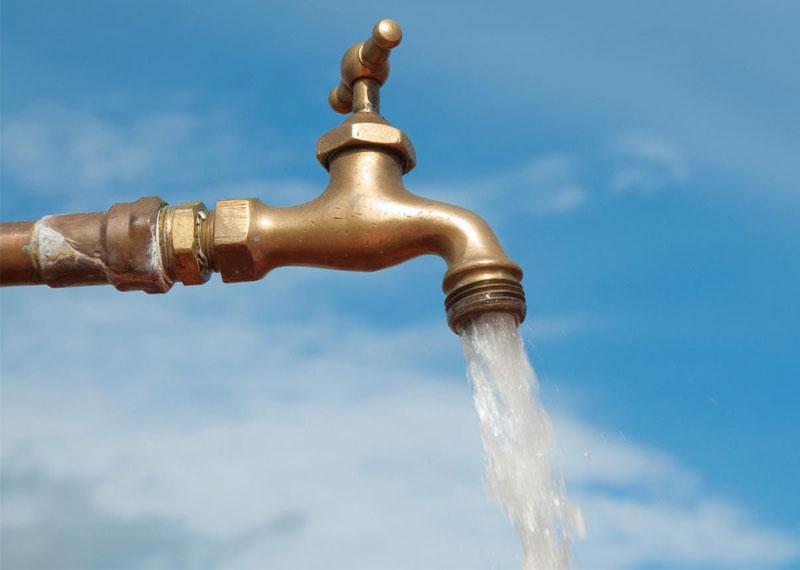 A faucet with water coming out of it