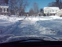 Passable road during snowstorm