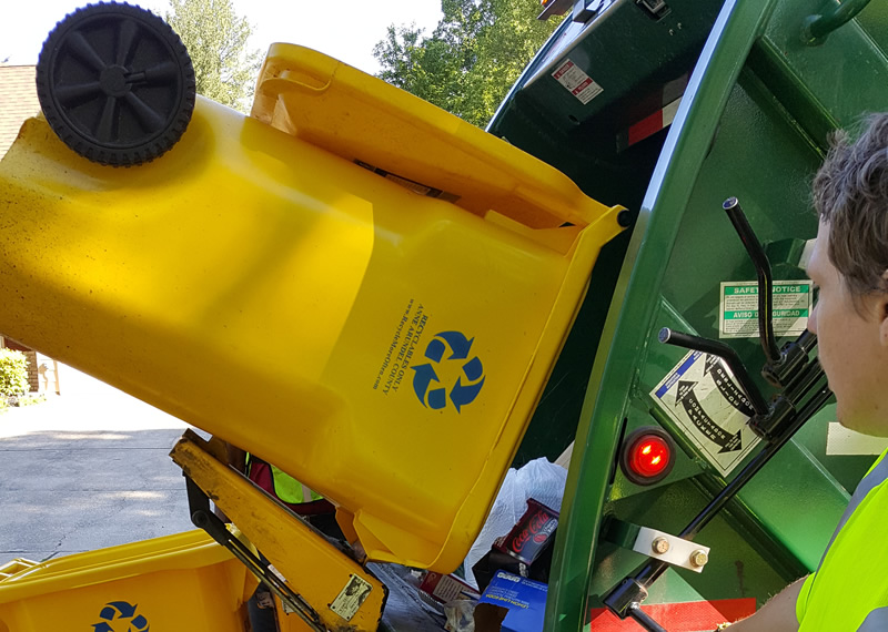 Disposal of Recycling into truck