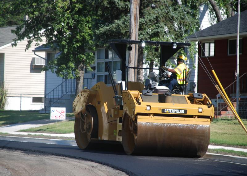 County Worker Paving 