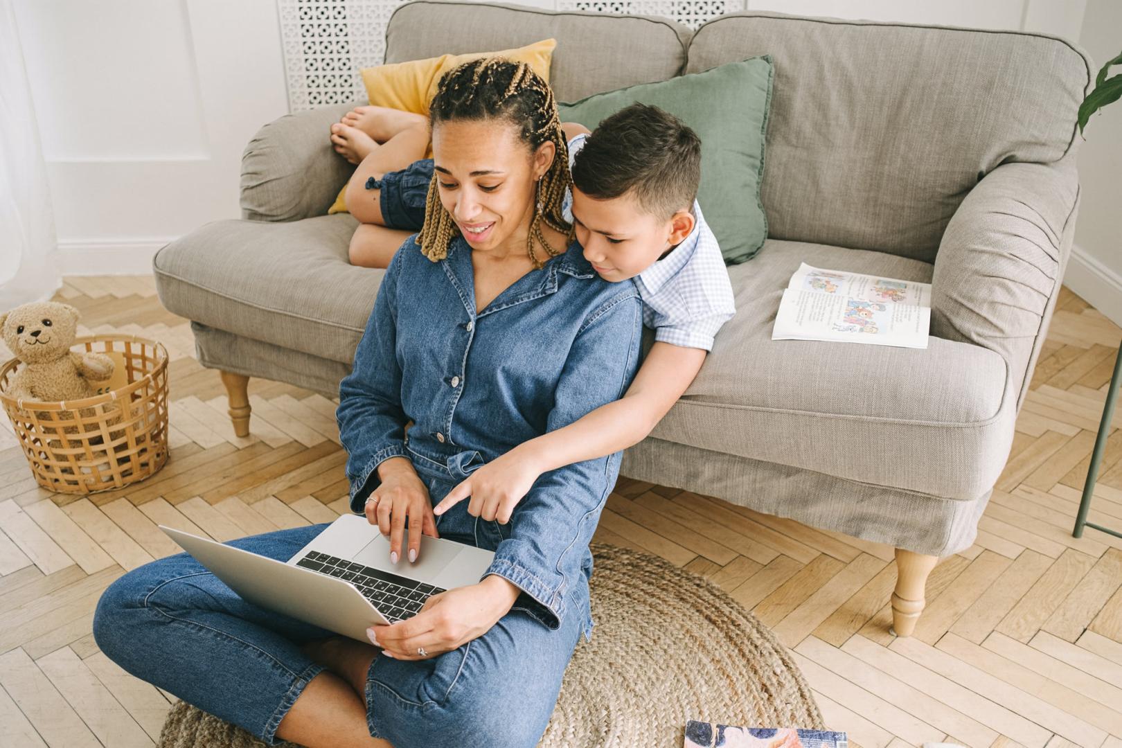 Woman with son looking at computer