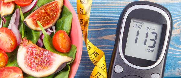 Cut up fruit and a sugar meter