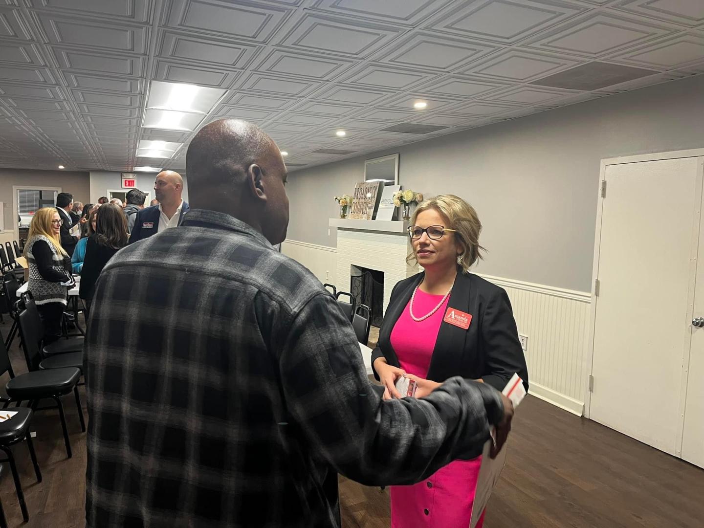 Amanda Fiedler talking with a constituent