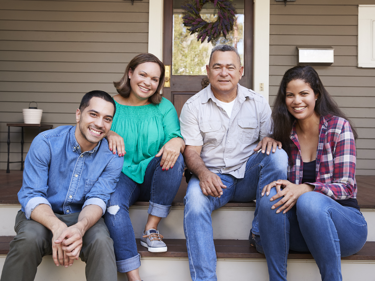 family sitting on steps