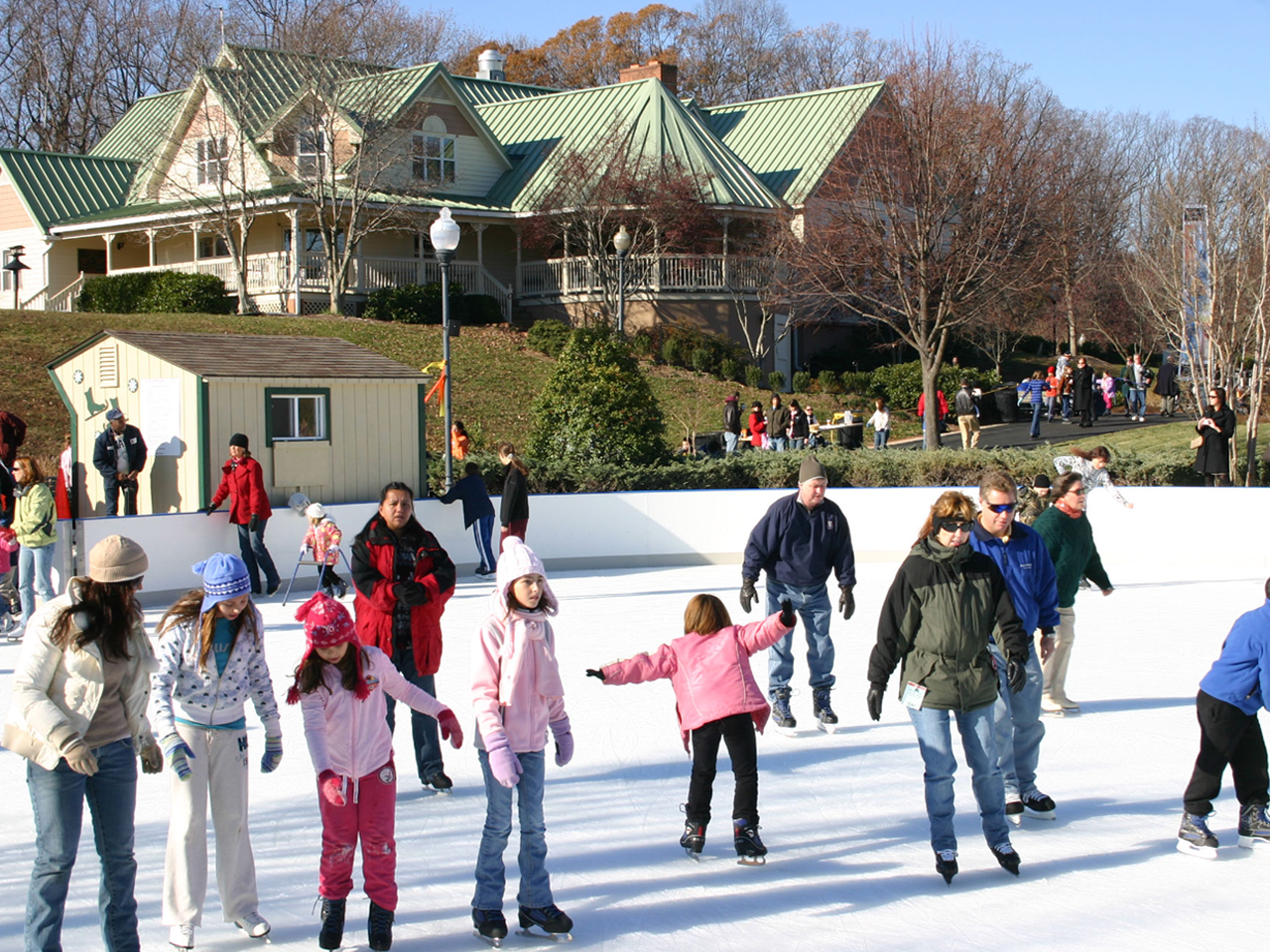 people at outdoor ice rink