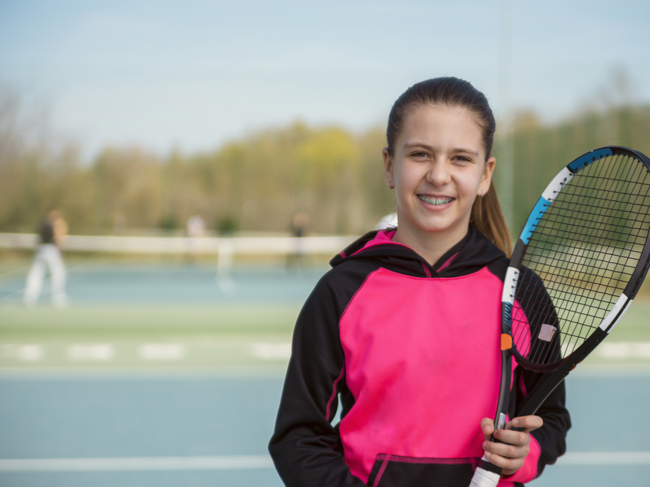 girl with tennis racket