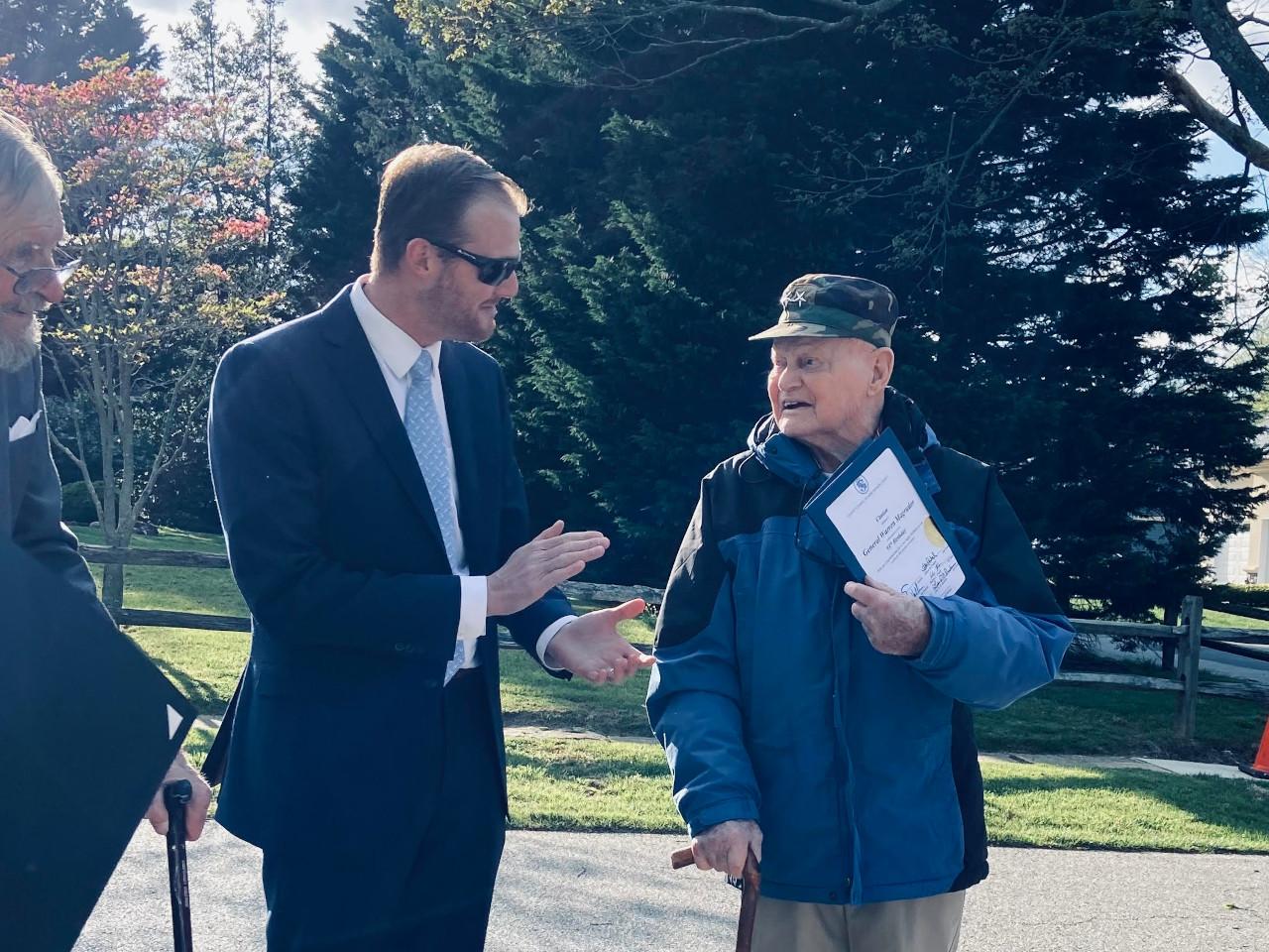 Councilmember Volke with a constituent