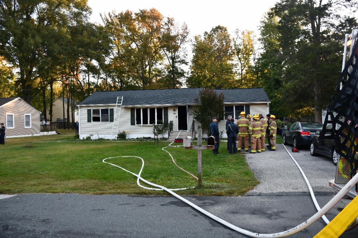 house with firefighters