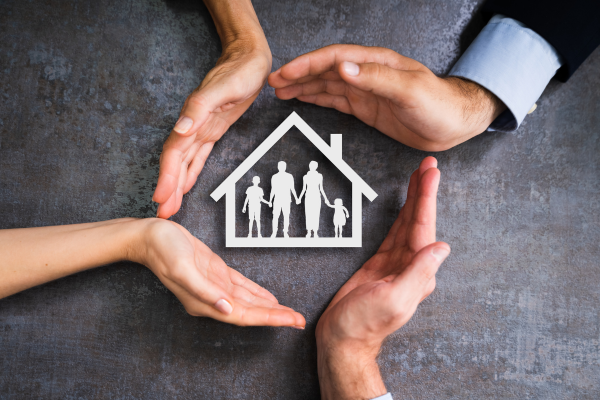 Hands around a home