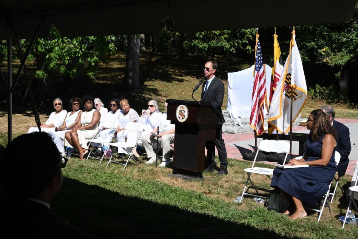 County Executive Steuart Pittman speaking at a podium