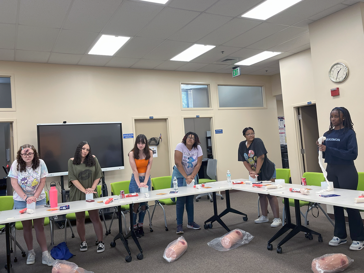 Young ladies doing cpr