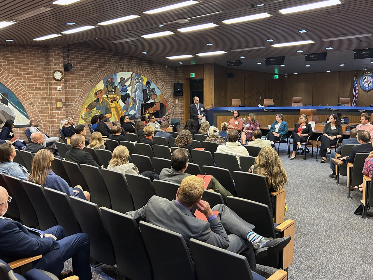Group of people inside the County Council chambers
