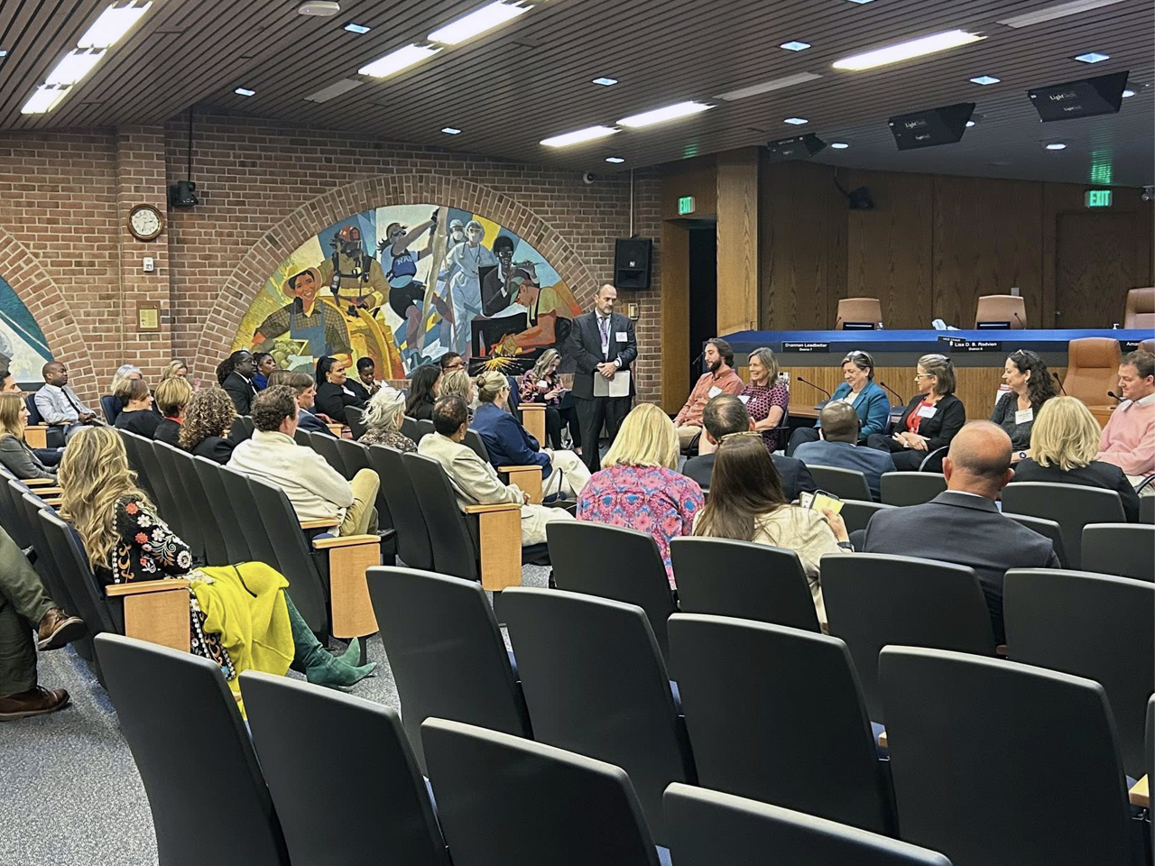 Group of people inside the County Council chambers