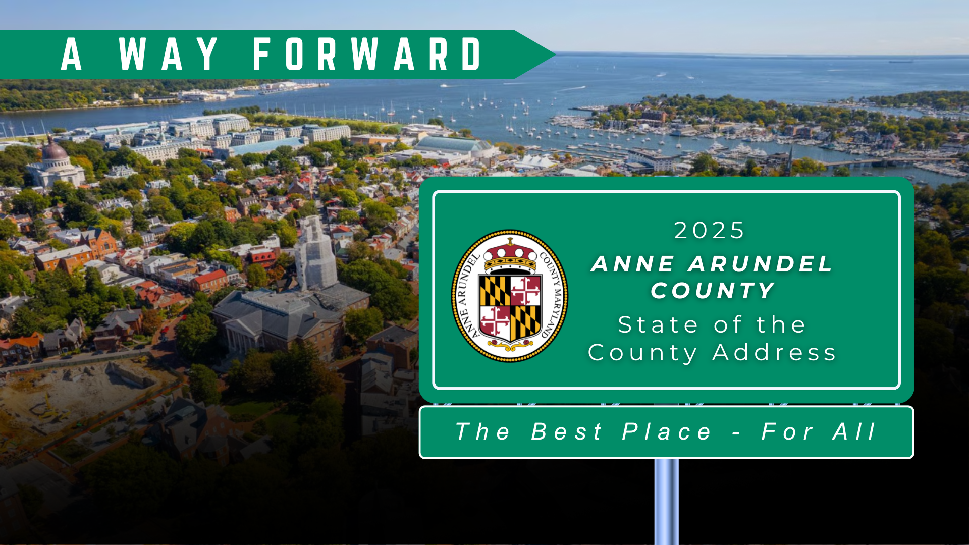 Aerial Image of Anne Arundel county with green street signs that say "A Way Forward" and "2025 Anne Arundel County State of the County Address" and "The Best Place - For All"