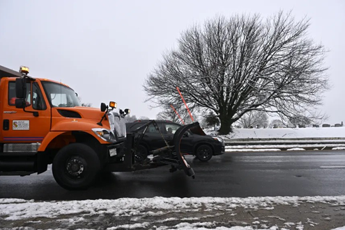 Snowplow drives road