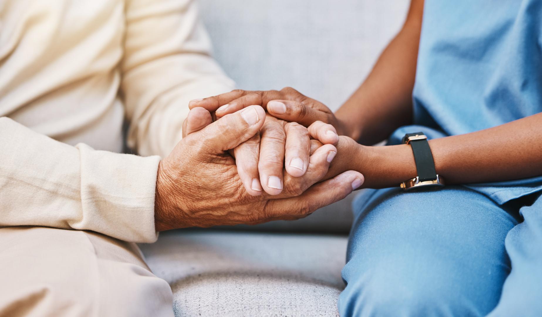 Nurse, hands and senior patient in empathy, safety and support of help, trust and healthcare consulting. Nursing home, counseling and gratitude for medical caregiver, client and hope in consultation stock photo