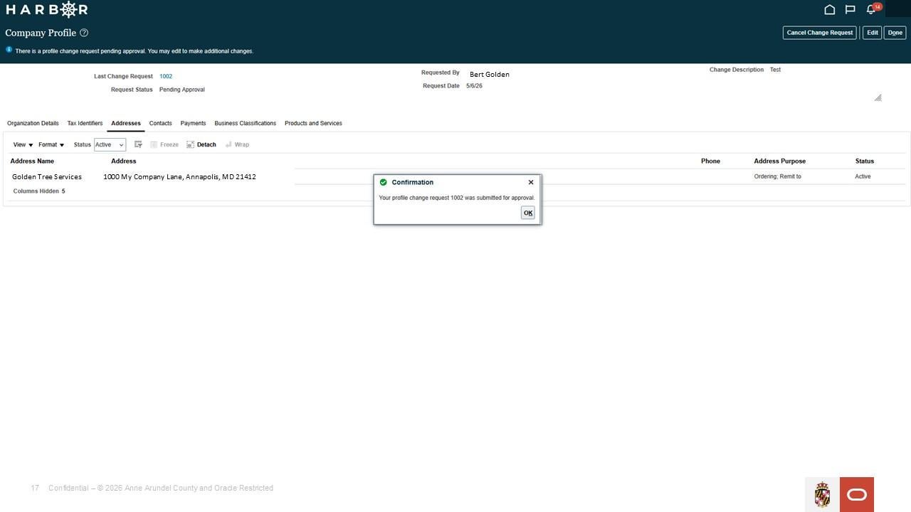 The Company Profile screen in the Harbor system with a confirmation pop up stating that the profile change was submitted for approval