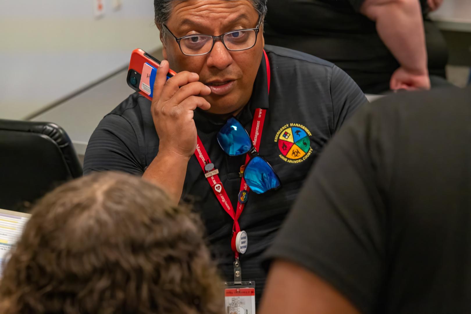 guiding participants through a hands-on learning activity during the HERoes on the HERizon camp."