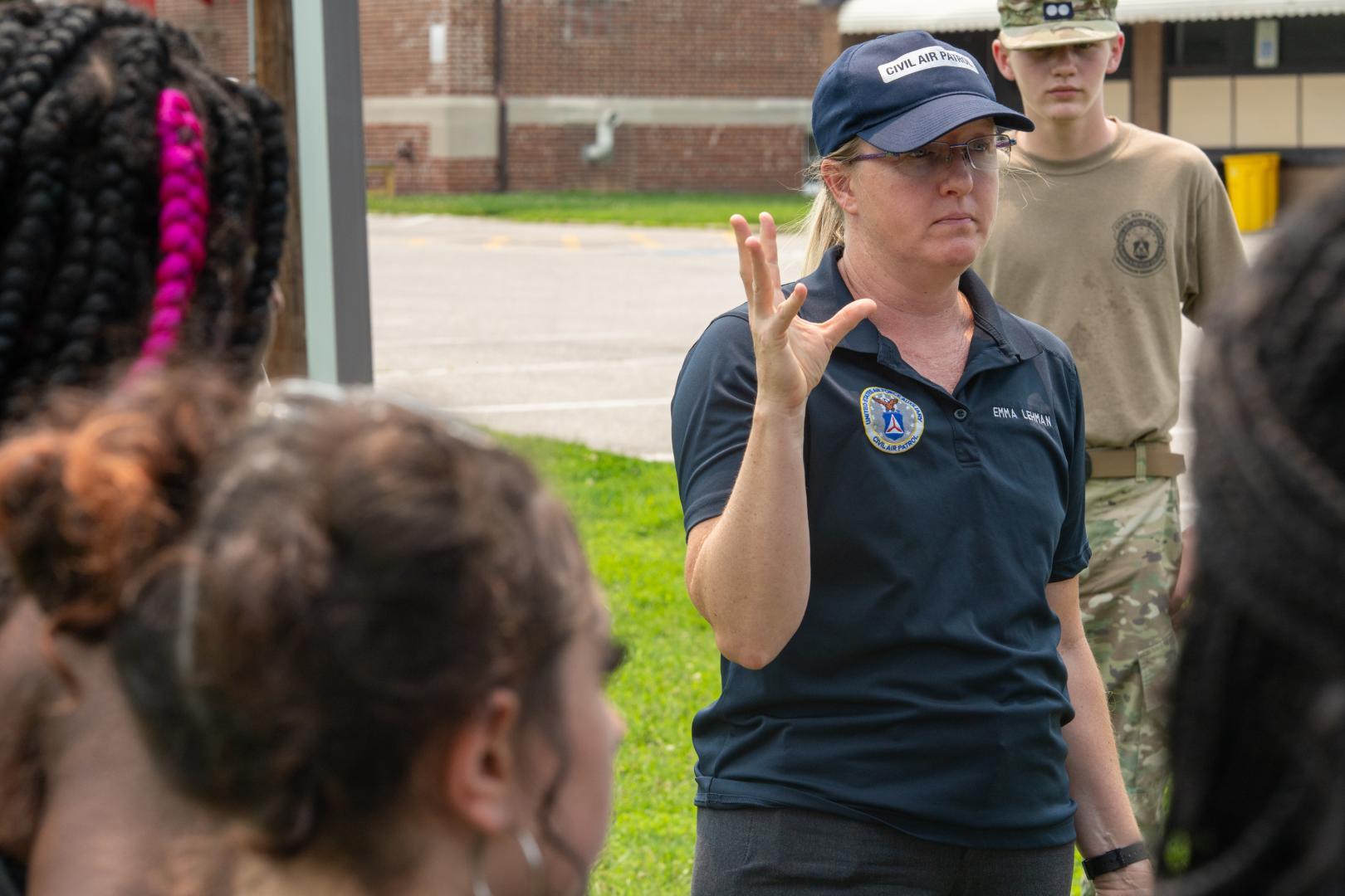 A speaker addressing a group of young campers