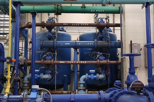 2 large blue water tanks